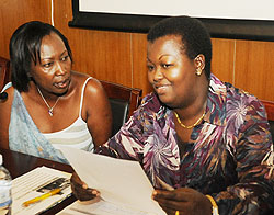 L-R Shema Xaverine second vice president of FAWE and Dr Kathy Kantengwa,  president of FAWE at the annual general meeting (Photo T.Kisambira)