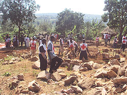 Rwanda Red Cross (RRC) volunteers laying foundation of the houses in Nyamata Sector, Bugesera district. Photo G. Mugoya