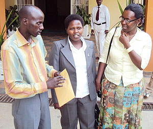 Rugabano Sector Executive Secretary, Cyriaque Niyonsaba (L), explains a point to MP Landarada Umuraza (C) and Senator Henriette Umulisa yesterday (Photo S.Nkurunziza)