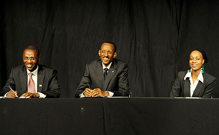 President Kagame takes questions from the audience - flanked by Ambassador Gerald Ntwari and Patricia Sugi, representative of diaspora youth. (Photo Village Urugwiro)