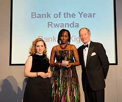 Linda Gihana Kalimba first Councelor in Rwandan Embassy in London receiving the award(Courtesy  Photo)