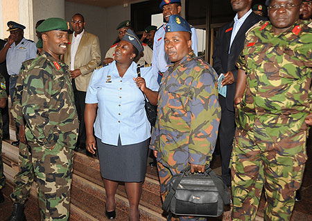 The Chief of Defence Staff Lt. Gen. Charles Kayonga (L) talking to the delegation from the Kenya National Defence College.