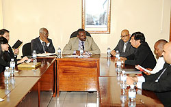 Rogers Muyampenda the CEO of PSF and Robert Bayigamba meeting the singapore delegation at PSF( Photo T.Kisambira)