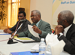  L-R Didacus Obunga of OIM, Gatsinzi Marcel, Minister of Disaster  Preparedness and Paul Gomis  Project Manager of OIM during the workshop, yesterday (Photo T.Kisambira)