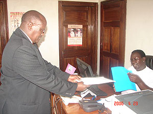 Frank Rusanganwa presenting the petition to Senior Assistant Administrator UNHRC Margaret Nakawuka