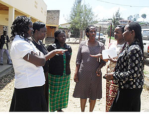 YWCA officals and their partners discuss ways of rolling out the new programme. (Photo; D.Sabiiti)