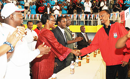 President Paul Kagame greets delegates upon arrival at the 10th RPF Congress, yesterday. (Photo J Mbanda)