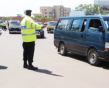 A Traffic Police officer on duty in a Kigali Street. Police has concluded training of officers on road safety (File Photo)