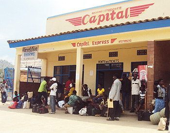 Stranded passengers at one of the bus terminals in Karongi town yesterday (photo S Nkurunziza)