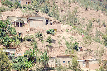 Some of the houses bult on sloppy hills in Kimisagara. The District has threated to raze down illegally built houses (Photo T.Kisambira)