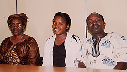 Diana Munyana Musoni (C) the best student in O-level with her parents, yesterday (Photo T.Kisambira)