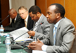 (R-L) Ignatius Kabagambe,DG Minister of Information, Prof Anastase Shyaka Executive Secretary of RGAC, Denis Weller, USAID, and Alphonse Nkusi (Photo T.Kisambira)