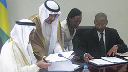 The Vice Chairman and Managing Director of Saudi Fund for Development Eng. Yousef Ibn Ibrahim Al-Bassam (L) and the Minister of Finance, John Rwangombwa (R) signing the loan agreements