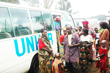 Returnees from DRC disembark from a UNHCR van. Government has launched another campaign to repatriate refugees (File Photo)