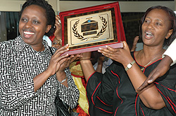 City Mayor Kirabo Kacyira (L) with  vice Mayor, Jeanne d'Arc Gakuba, display a KCC award. Kirabo will not seek re-election (File Photo)