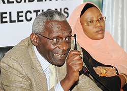 NEC chairman Prof Crysologue Karangwa and his vice Fatou Harerimana at a recent press conference (File Photo)