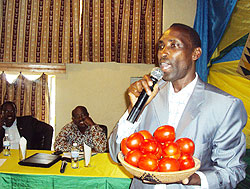 One of the resident tells his success story as a result of good governance, while  Minister Musoni and governor Ndayisaba look on. Photo D Sabiiti