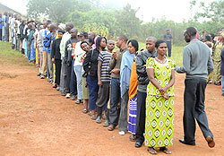 Voters queue behind their candidate. NEC has defended this system saying its transparent. (File photo)