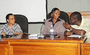 Ministers Stanislas Kamanzi of Environment (R) and Coletha Ruhamya of Water and Energy (c) with REMA Director General, Rose Mukankomeje, during the meeting, yesterday. (Photo J Mbanda)