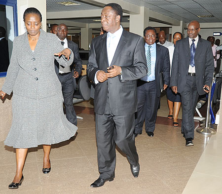 RRA Commissioner General, Mary Baine (L), with Ghanau2019s Finance Minister, Kwabena Duffuor, during a tour of Rwanda Revenue Authority, yesterday. Following closely is RRAu2019s former Commissioner General, Edward Larbi-Siaw and Deputy Commisioner, Ben Kagarama 