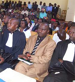 Judicial officials and residents listen to speeches during the launch of anti-corruption week in courts. (Photo by A.Gahene)