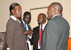 Minister of Foreign Affairs, Louise Mushikiwabo,  talking to Senator Wellars Gasamagera yesterday (Photo J Mbanda)