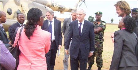 The visiting Dutch Minister, Dr. Ben Knapen, chats with community leaders from Gicumbi district during his tour of the Dutch funded projects in the Northern Province on Wednesday.(File Photo)