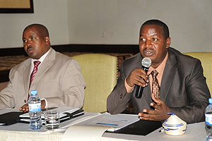 Permanent Secretary in MINALOC, Cyril Turatsinze (R), speaking at the meeting. Left is Director General in the Ministry, Egide Rugamba. (Photo J Mbanda)