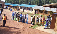 Residents  of Gashirwe village line up to cast their votes at Gacurabwenge polling station.(Photo A Gahene)