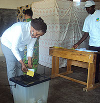 A lady casts her ballot in Karongi District yesterday (Photo S Nkurunziza)