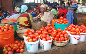 Market vendors in Kimironko market, Minister Monique Nsanzabaganwa plots measures to control hoarding. (File photo)