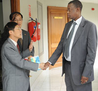 Ambassador Shu Zhan with Gen. James Kabarebe at the latteru2019s office yesterday.(Photo: J Mbanda)