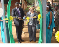 Defence Minister Gen James Kabarebe (L) and Lynda Cherry OEU during the innauguration of the Kanombe facility (Courtsey Photo)