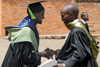 Graduates congratulating each other during the KHI event yesterday (Photo T Kisambira)