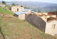 Some of the houses destroyed  by the rains at Unity and Reconciliation village on Thursday.photo by A.Gahene