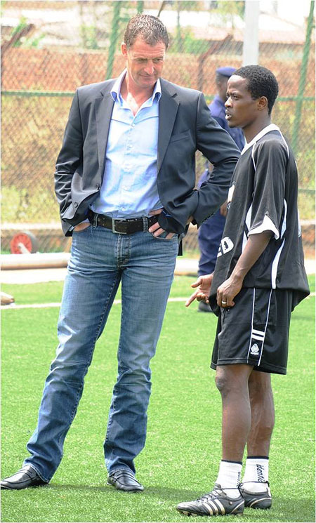 Ernest Brandts exchanges ideas with one of his most senior players Haruna Niyonzima during his early days in the job. (File photo)