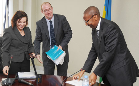 (L-R) Head of DFID Rwanda, Elizabeth Carriere, UK Envoy to Rwanda Benedict Llewellyn-Jones and Minister John Rwangombwa. (photo J Mbanda).