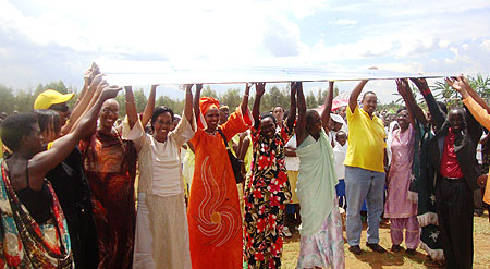 MTN officials joining AVEGA widows in the anti-Nyakatsi drive in Rwamagana last Tuesday.( Photo S. Rwembeho)