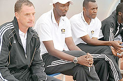 APR coach Ernest Brandts and his assistants during a previous Primus league game. The Dutchman still has a 100% record after winning all 10 league matches.  (File photo)