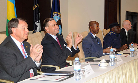 (L-R) FBINAA president Matt Raia, US envoy Stuart Symington, Internal Security Minister, Musa Fazil Harerimana IGP Emmanuel Gasana and Asst Director of FBI, Joseph Demarest, during the meeting (Photo T.Kisambira)