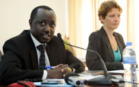 Joseph Kabakeza of the Diaspora directorate together with Sabine Boeltken programme coordinator of MIDA during the meeting (Photo T.Kisambira)