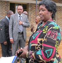 Executive Director of UNAIDS, Michel Sidibu00e9 (L) and MoH Permanent Secretary Dr. Agnes Binagwaho in Nyamata yesterday (Photo E. Musoni)