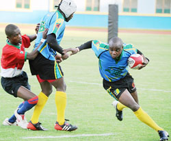 Silverbacks captain Vincent Kamali (R) during last year's CAR 15s tournament. He is expected to lead from the front. (File photo)