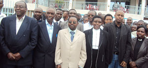 Bernadette Kanzayire (3rd right), Mayor Abdallah Murenzi (2nd right) pose with a group of clerics. 