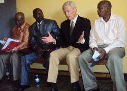 REX president Robert Pearson (2nd right) speaks to other stakeholders of the radio project in Kibuye (Photo S Nkurunziza).