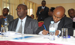 (L-R)Ministers Anastase Murekezi (Public Service) and Ignace Gatare (ICT) during the high level meeting yesterday (Photo T Kisambira)