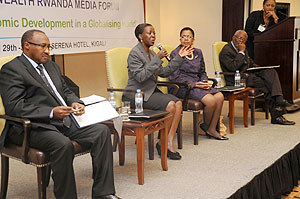 (L-R)Minister Protais Musoni, Foreign Affairs Minister Louise Mushikiwabo Commonwealth Deputy Secretary-General Mmasekgoa Masire-Mwamba, and Charles C.Okigbo during a conference on media development (Photo T.Kisambira)