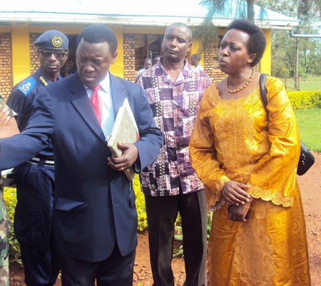 Damian Ntaganzwa (L), Vice Principal, talking to the delegation. Looking on is Governor Aisa Kirabo. (Photo: S. Rwembeho).