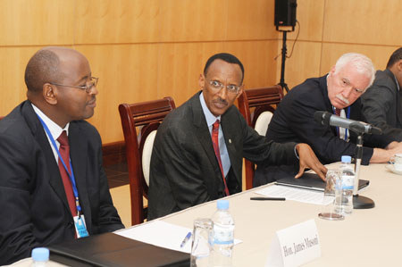 President Kagame, yesterday, chaired the 8th Presidential Advisory Committee meeting. Looking on is Joe Ritchie (R) and Minister of Local Government, James Musoni (L).