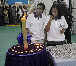 Candles being lit at the Genocide exhibition early this week.